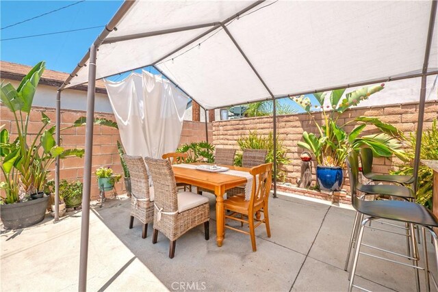 14121 Calais St, Baldwin Park, CA 91706 - fenced backyard with outdoor dining space and a patio