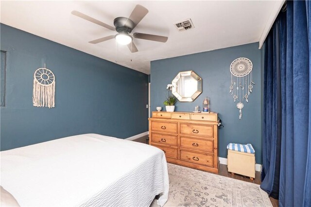14121 Calais St, Baldwin Park, CA 91706 - bedroom with baseboards, wood finished floors, and a ceiling fan