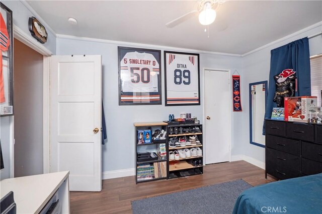 14121 Calais St, Baldwin Park, CA 91706 - bedroom with dark wood-style flooring, baseboards, and ornamental molding