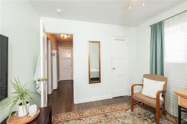 14121 Calais St, Baldwin Park, CA 91706 - sitting room featuring wood finished floors and baseboards