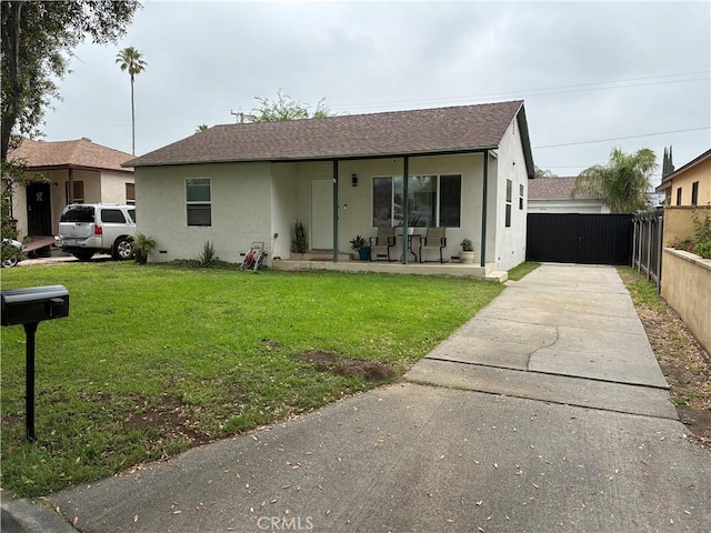 3535 N Mountain View Ave, San Bernardino, CA 92405 - view of front of house featuring stucco siding, a porch, concrete driveway, and roof with shingles