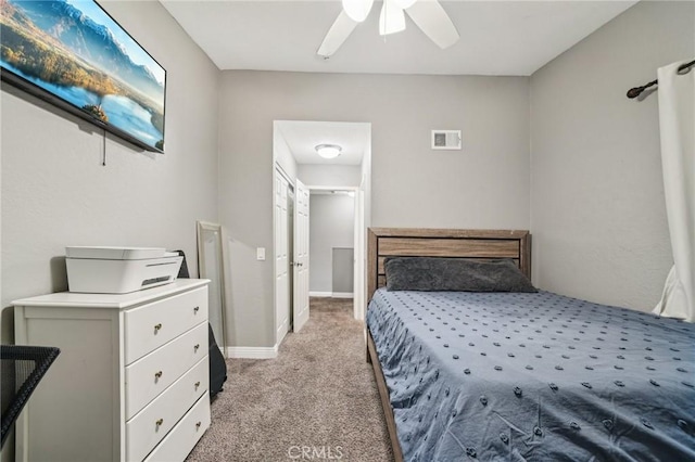 8167 Vineyard Ave Unit 109, Rancho Cucamonga, CA 91730 - bedroom featuring light carpet, baseboards, and a ceiling fan