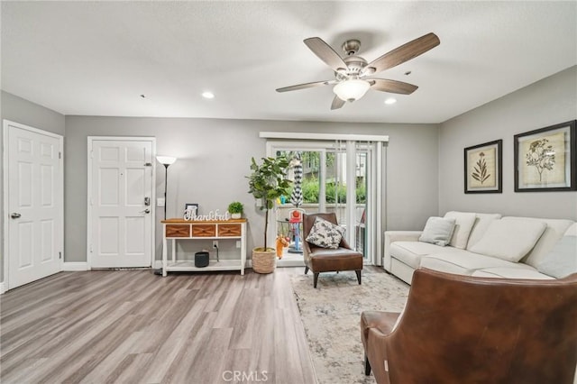 8167 Vineyard Ave Unit 109, Rancho Cucamonga, CA 91730 - living room featuring light wood-type flooring, ceiling fan, baseboards, and recessed lighting