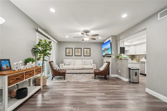 8167 Vineyard Ave Unit 109, Rancho Cucamonga, CA 91730 - living room featuring recessed lighting, a ceiling fan, wood finished floors, and baseboards
