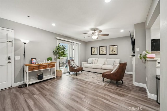 8167 Vineyard Ave Unit 109, Rancho Cucamonga, CA 91730 - living room with baseboards, wood finished floors, ceiling fan, and recessed lighting