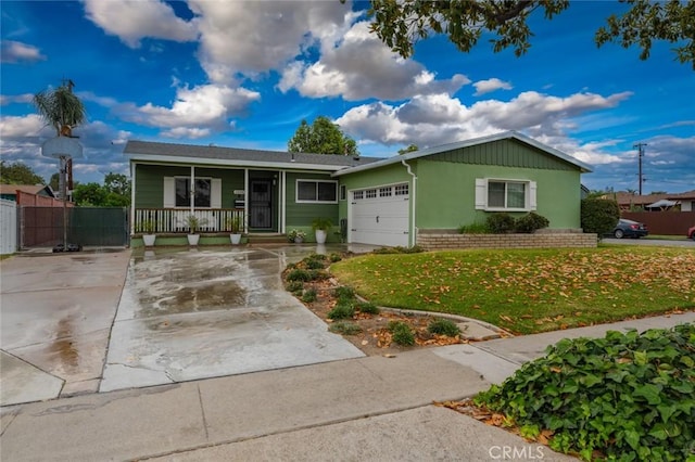 1501 W Baker Ave, Fullerton, CA 92833 - single story home with covered porch, an attached garage, and concrete driveway