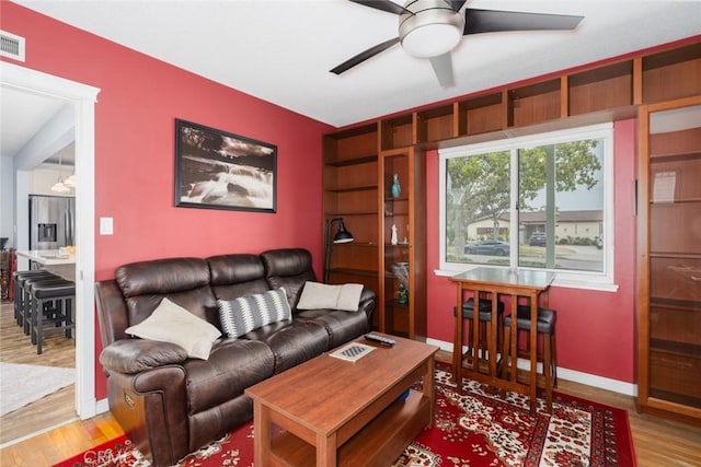 1501 W Baker Ave, Fullerton, CA 92833 - living room with ceiling fan, wood finished floors, and baseboards