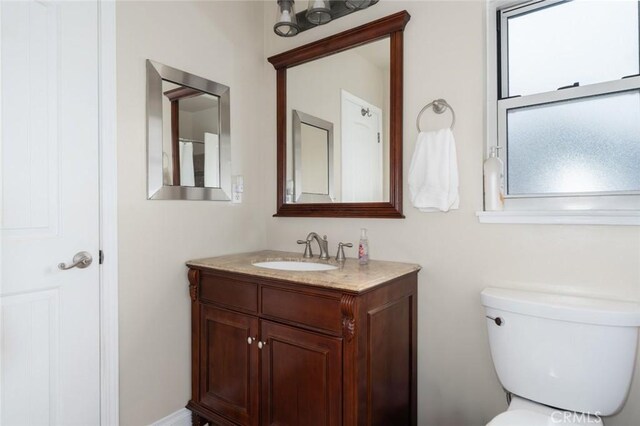 1501 W Baker Ave, Fullerton, CA 92833 - bathroom featuring vanity and toilet