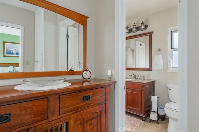 1501 W Baker Ave, Fullerton, CA 92833 - bathroom with vanity, toilet, and tile patterned flooring
