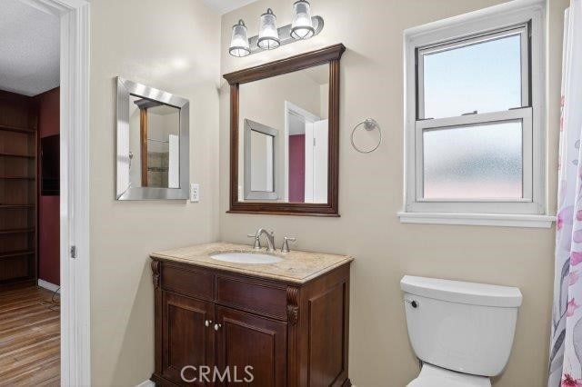 1501 W Baker Ave, Fullerton, CA 92833 - bathroom with vanity and wood finished floors