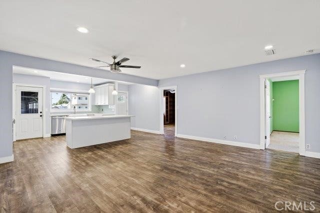 1501 W Baker Ave, Fullerton, CA 92833 - unfurnished living room with ceiling fan, dark wood finished floors, and recessed lighting