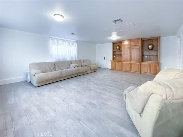 42722 20th St W, Lancaster, CA 93534 - living area featuring light wood-style flooring and baseboards