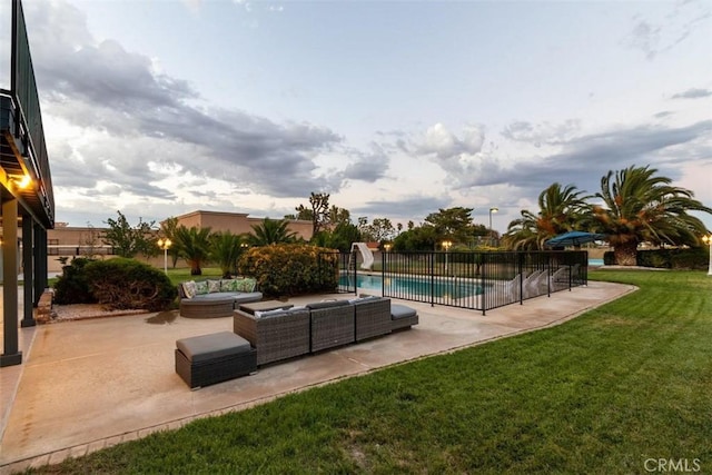 42722 20th St W, Lancaster, CA 93534 - view of swimming pool with a water slide, a patio area, and an outdoor living space
