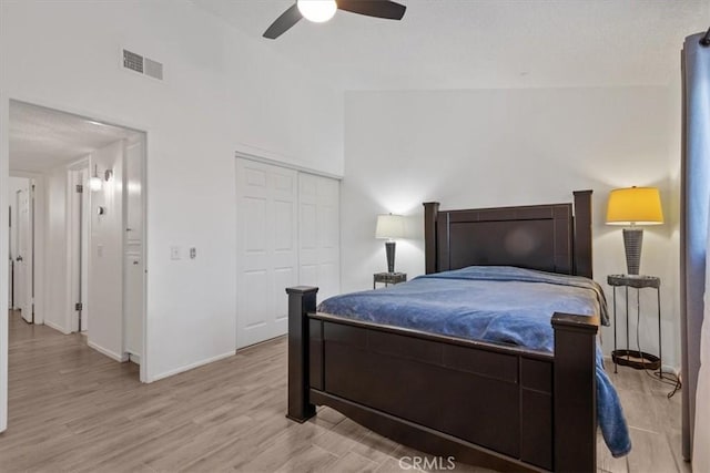 42722 20th St W, Lancaster, CA 93534 - bedroom with light wood-style floors, a closet, and a ceiling fan