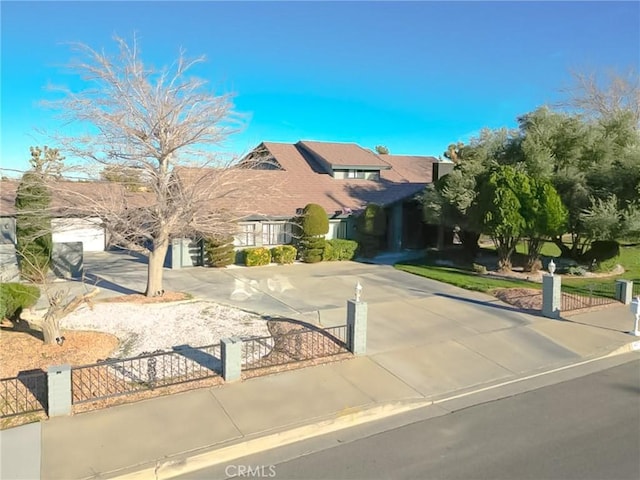 42722 20th St W, Lancaster, CA 93534 - view of front of property with a fenced front yard and concrete driveway