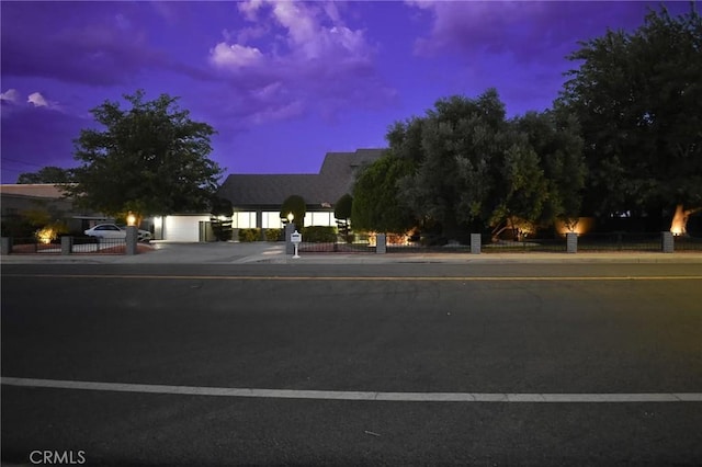 42722 20th St W, Lancaster, CA 93534 - obstructed view of property featuring a garage and driveway