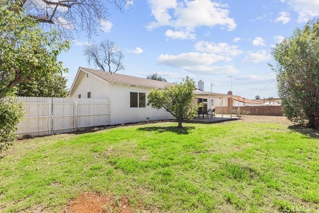 246 Aldama Ave, Pomona, CA 91767 - rear view of property featuring a fenced backyard