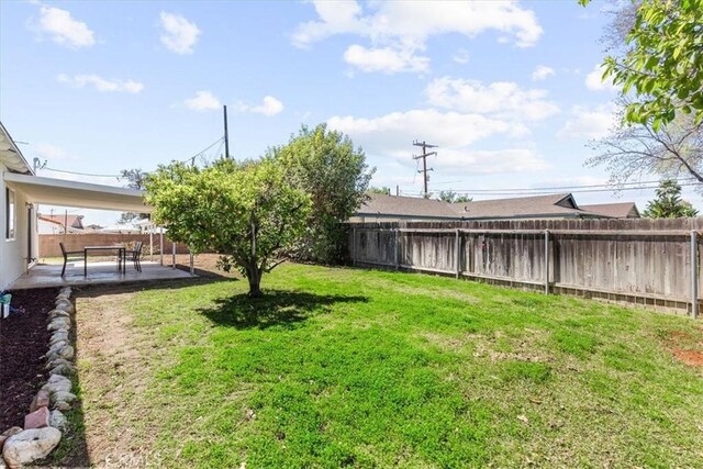 246 Aldama Ave, Pomona, CA 91767 - fenced backyard with a patio