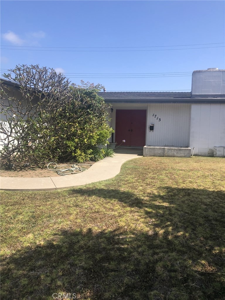 1713 Oahu Pl, Costa Mesa, CA 92626 - view of exterior entry featuring a lawn