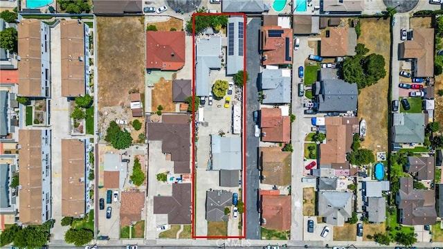 546 E 220th St, Carson, CA 90745 - aerial overview of property's location with property parcel outlined and nearby suburban area