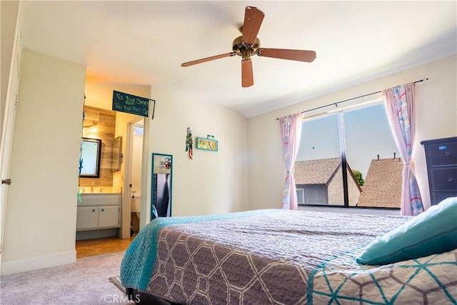 1643 Golden Tree Ct Unit C, Corona, CA 92879 - bedroom with carpet flooring, baseboards, connected bathroom, and ceiling fan
