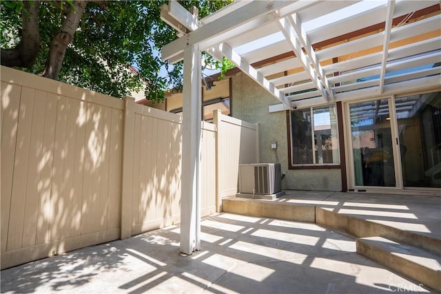 1643 Golden Tree Ct Unit C, Corona, CA 92879 - view of patio featuring central AC unit and a pergola