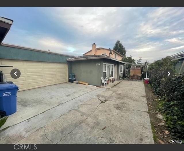 15122 Eastwood Ave, Lawndale, CA 90260 - view of home's exterior with stucco siding and a garage
