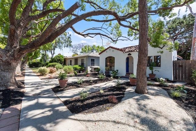 3556 Olive Ave, Long Beach, CA 90807 - mediterranean / spanish-style house featuring stucco siding and a tile roof