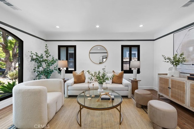 3556 Olive Ave, Long Beach, CA 90807 - living room featuring recessed lighting, baseboards, and wood finished floors