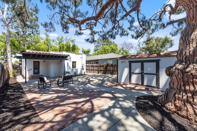 3556 Olive Ave, Long Beach, CA 90807 - fenced backyard with a patio