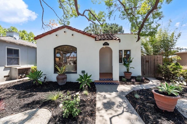 3556 Olive Ave, Long Beach, CA 90807 - mediterranean / spanish-style house featuring stucco siding and a tiled roof