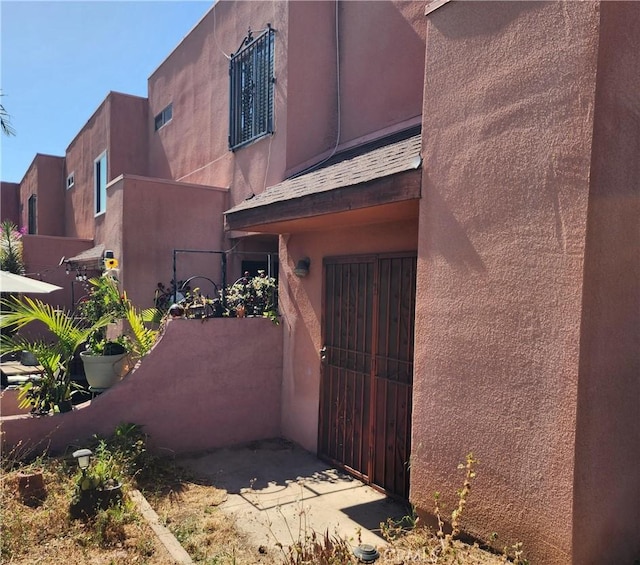 411 N Brannick Unit B, Los Angeles, CA 90063 - doorway to property with a gate and stucco siding