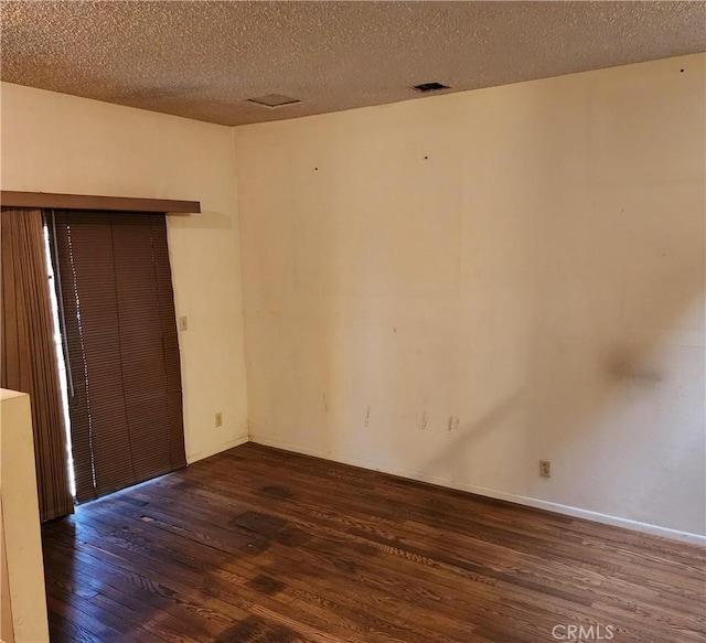 411 N Brannick Unit B, Los Angeles, CA 90063 - spare room featuring wood finished floors and a textured ceiling