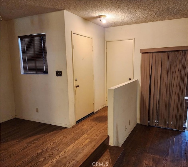 411 N Brannick Unit B, Los Angeles, CA 90063 - unfurnished room featuring wood finished floors and a textured ceiling