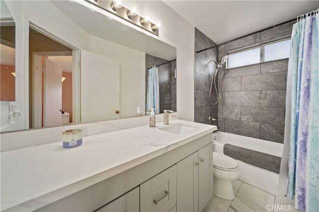 43816 Fallon Dr, Lancaster, CA 93535 - full bath featuring toilet, vanity, marble look tiles, and shower / tub combo