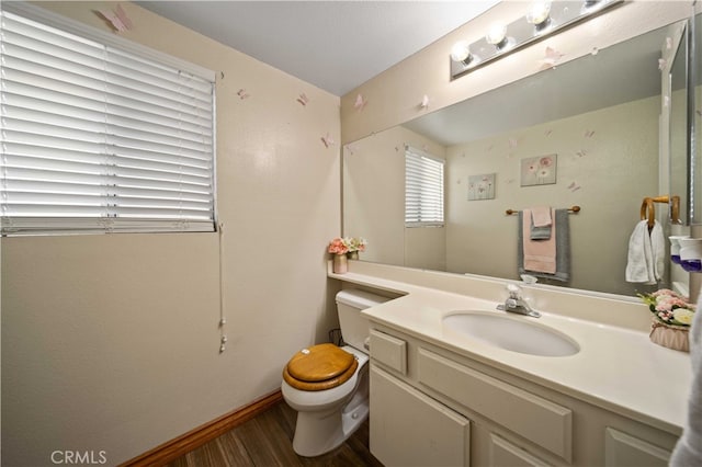 43816 Fallon Dr, Lancaster, CA 93535 - half bath with toilet, wood finished floors, and vanity