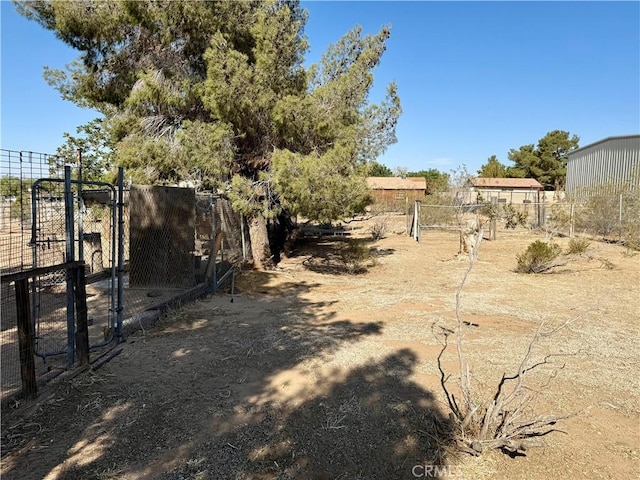 18083 Deodar St, Hesperia, CA 92345 - view of yard with a gate