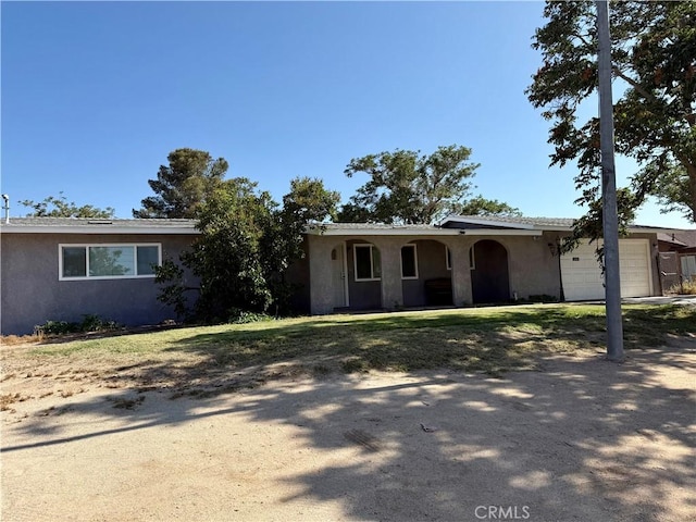 18083 Deodar St, Hesperia, CA 92345 - single story home with stucco siding and a garage