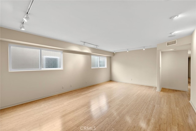 1623 W Balboa Blvd, Newport Beach, CA 92663 - unfurnished room featuring track lighting, light wood-type flooring, and baseboards