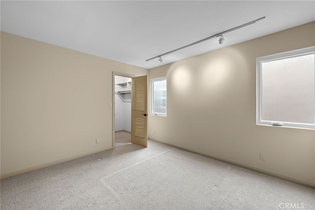 1623 W Balboa Blvd, Newport Beach, CA 92663 - carpeted spare room featuring track lighting and baseboards