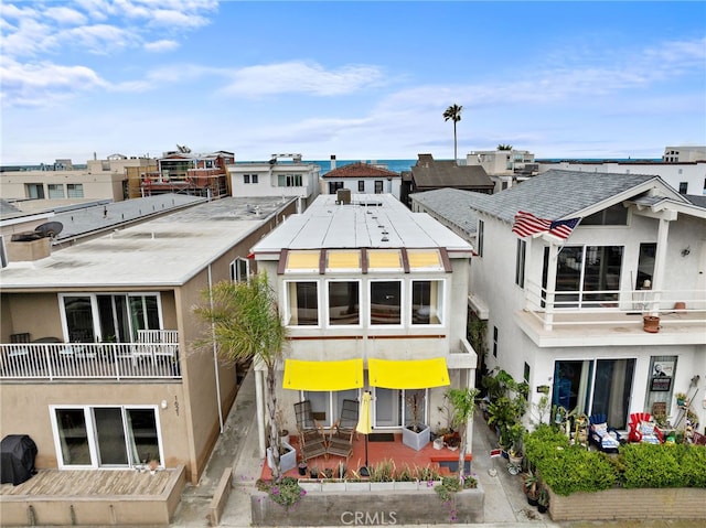 1623 W Balboa Blvd, Newport Beach, CA 92663 - rear view of house featuring stucco siding