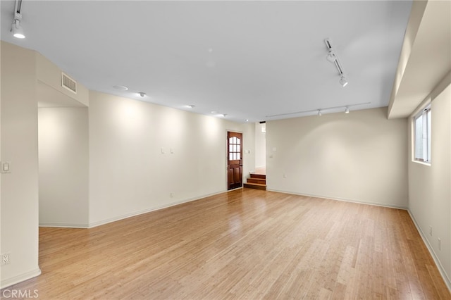 1623 W Balboa Blvd, Newport Beach, CA 92663 - unfurnished room with track lighting, light wood-type flooring, plenty of natural light, and baseboards
