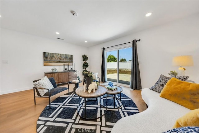 144 N Dommer Ave, Walnut, CA 91789 - living area featuring wood finished floors, recessed lighting, and baseboards