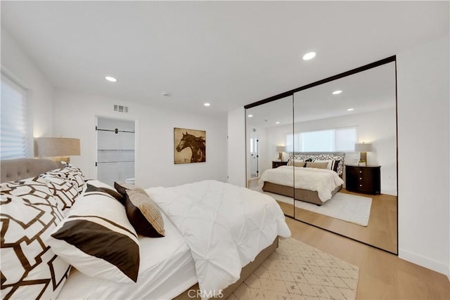 144 N Dommer Ave, Walnut, CA 91789 - bedroom featuring light wood-style floors, recessed lighting, and a closet