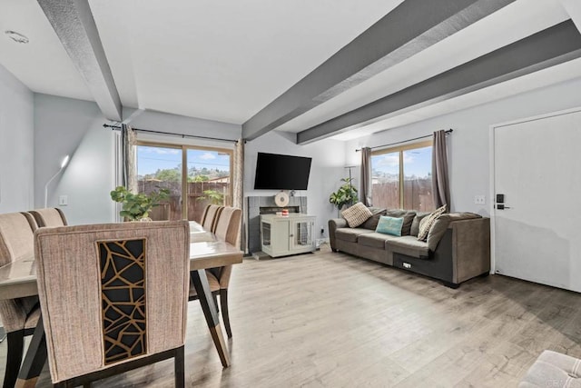 1380 E Washington Ave Unit 2, El Cajon, CA 92019 - dining area featuring beam ceiling, plenty of natural light, and light wood-style floors
