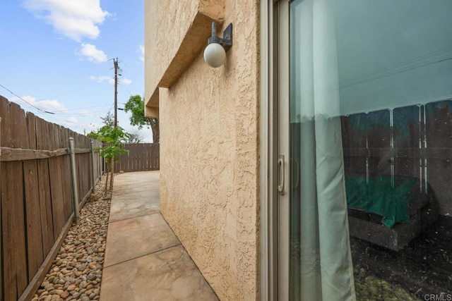 1380 E Washington Ave Unit 2, El Cajon, CA 92019 - view of side of property with a fenced backyard and stucco siding