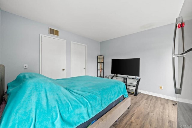 1380 E Washington Ave Unit 2, El Cajon, CA 92019 - bedroom with wood finished floors and baseboards
