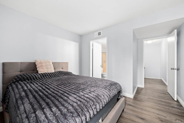 1380 E Washington Ave Unit 2, El Cajon, CA 92019 - bedroom with baseboards and wood finished floors