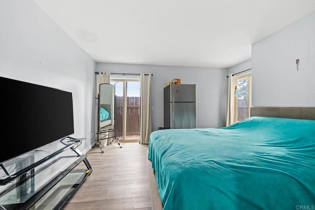 1380 E Washington Ave Unit 2, El Cajon, CA 92019 - bedroom with multiple windows and wood finished floors