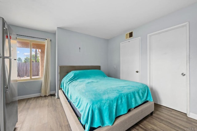 1380 E Washington Ave Unit 2, El Cajon, CA 92019 - bedroom featuring freestanding refrigerator, light wood-style flooring, and baseboards